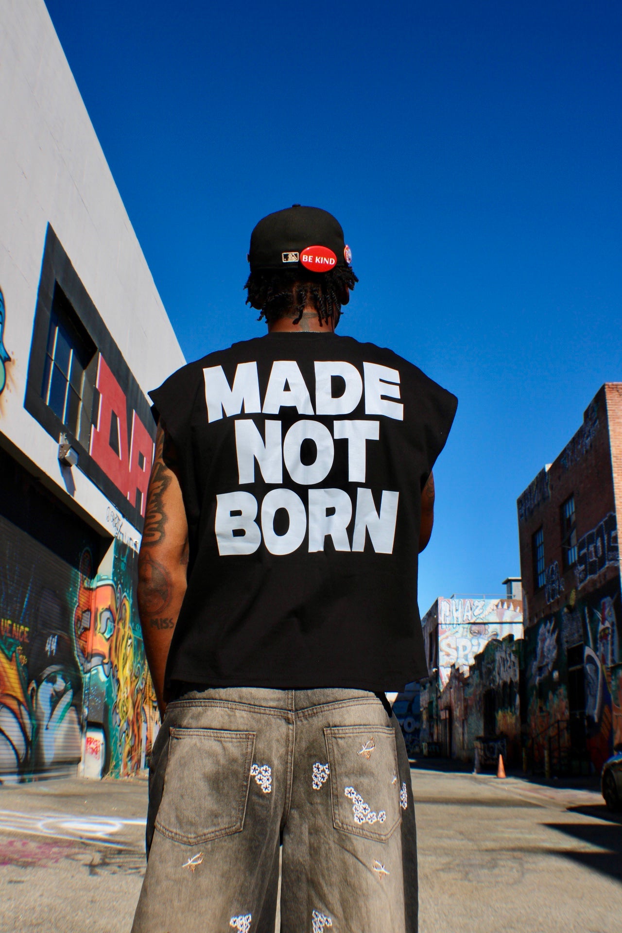 MADE NOT BORN CROPPED CUT OFF